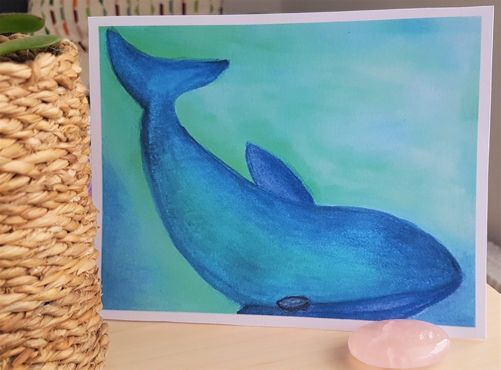 Peinture aquarelle d'une baleine bleue nageant.